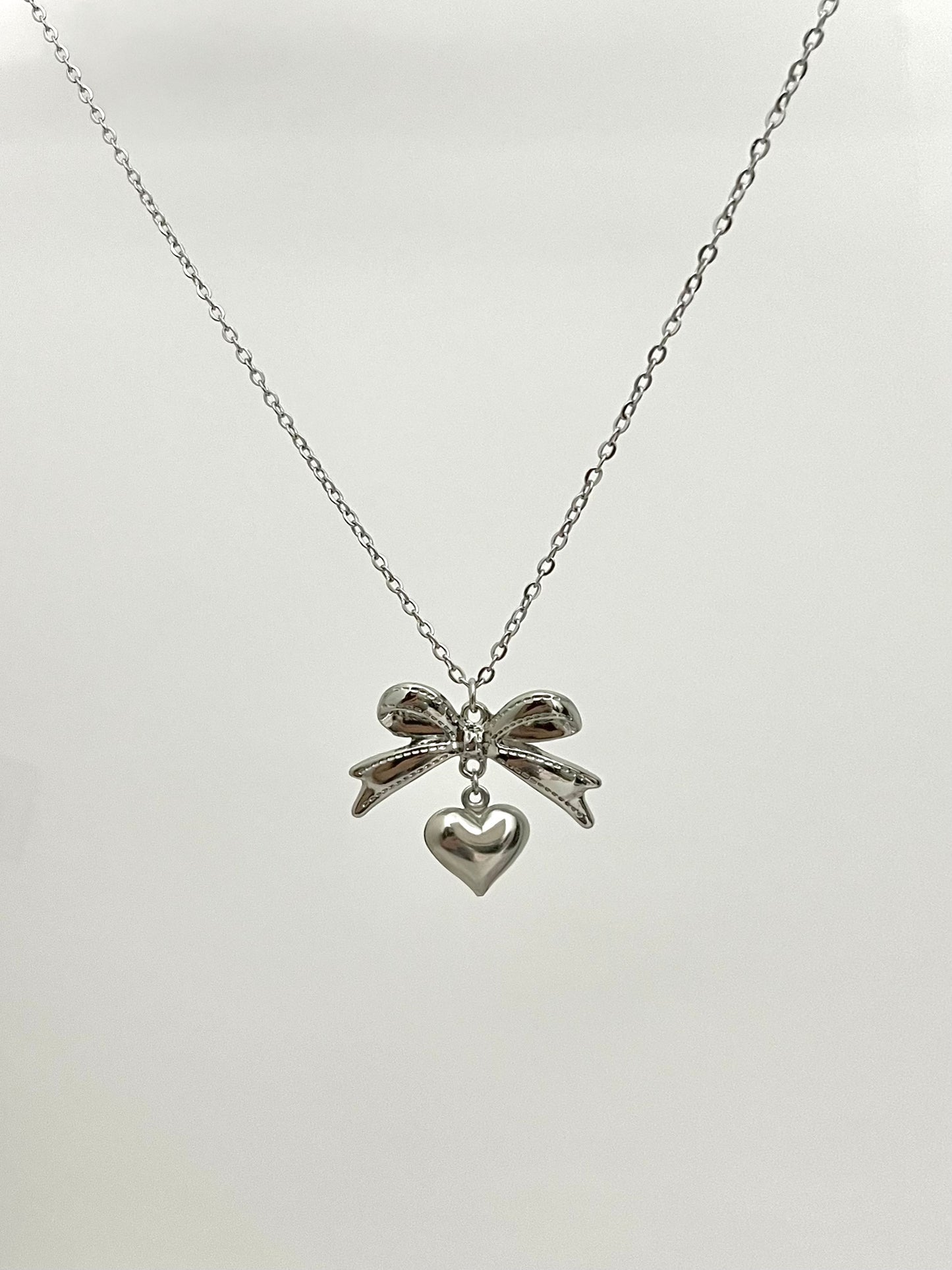 SILVER COQUETTE NECKLACE