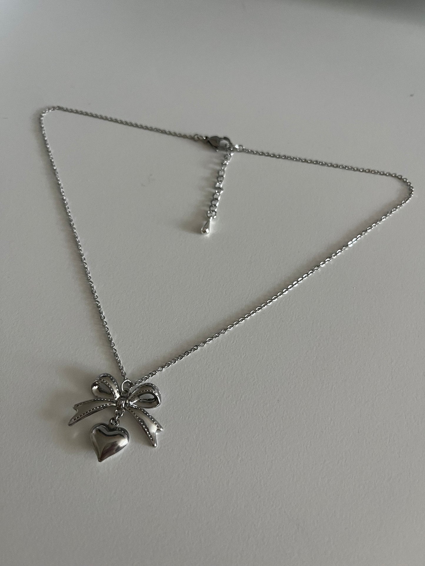 SILVER COQUETTE NECKLACE